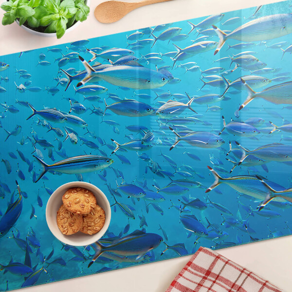 Tagliere in vetro temperato con decorazione raffigurante un banco di pesci sull'acqua
