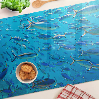 Tagliere in vetro temperato con decorazione raffigurante un banco di pesci sull'acqua
