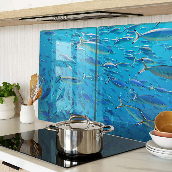 Tagliere in vetro temperato con decorazione raffigurante un banco di pesci sull'acqua