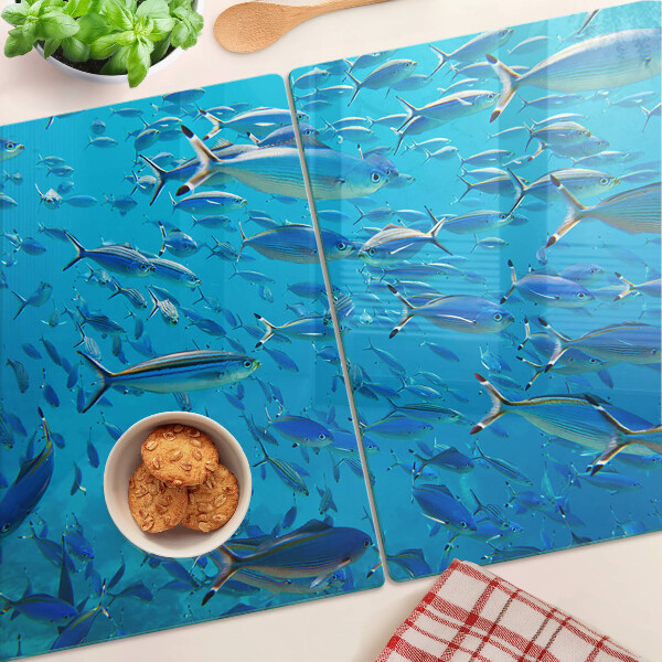 Tagliere in vetro temperato con decorazione raffigurante un banco di pesci sull'acqua