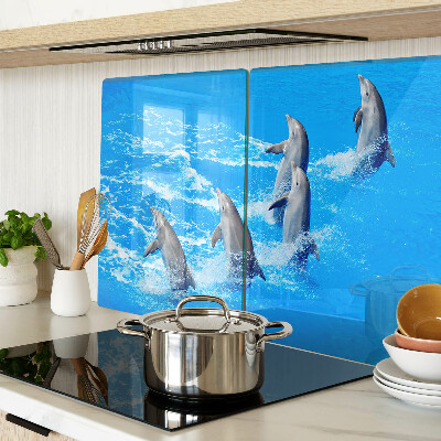 Tagliere in vetro con motivo di delfini che saltano tra le onde