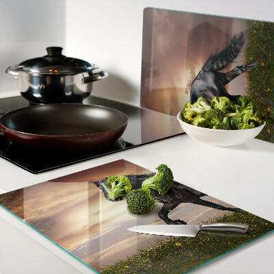 Tagliere in vetro temperato con stampa di un cavallo davanti al sole al tramonto