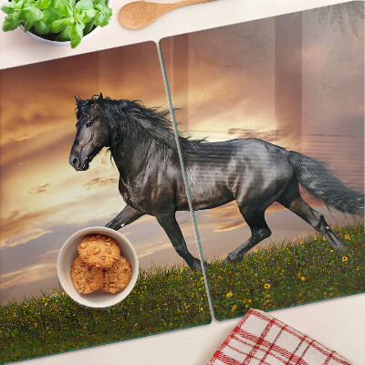 Tagliere in vetro temperato con stampa di un cavallo davanti al sole al tramonto
