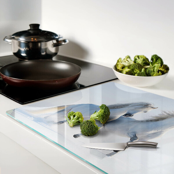 Tagliere in vetro temperato con stampa raffigurante due cavalli bianchi in pieno galoppo