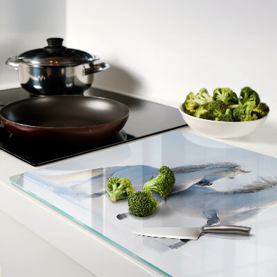 Tagliere in vetro temperato con stampa raffigurante due cavalli bianchi in pieno galoppo