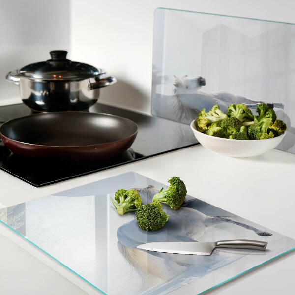 Tagliere in vetro temperato con stampa raffigurante due cavalli bianchi in pieno galoppo