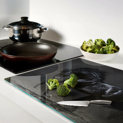 Tagliere in vetro con stampa di un cavallo nero in movimento