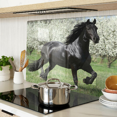 Tagliere in vetro temperato con stampa di un cavallo nero sul prato