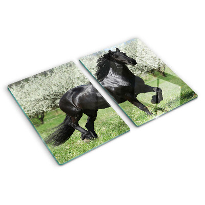 Tagliere in vetro temperato con stampa di un cavallo nero sul prato