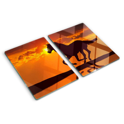 Tagliere in vetro con stampa di un cavallo davanti al sole al tramonto