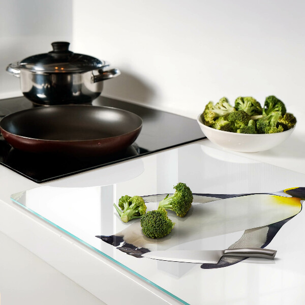 Tagliere in vetro con stampa di un pinguino sul ghiaccio