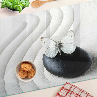 Tagliere in vetro temperato con motivo di farfalla su fondo effetto pietra