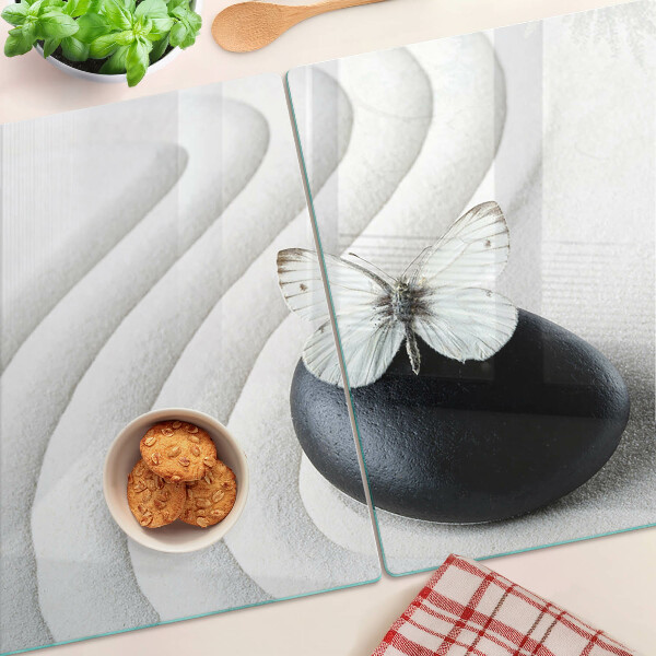 Tagliere in vetro temperato con motivo di farfalla su fondo effetto pietra