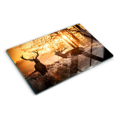 Tagliere in vetro temperato con stampa raffigurante cervi nel bosco al tramonto
