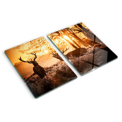 Tagliere in vetro temperato con stampa raffigurante cervi nel bosco al tramonto
