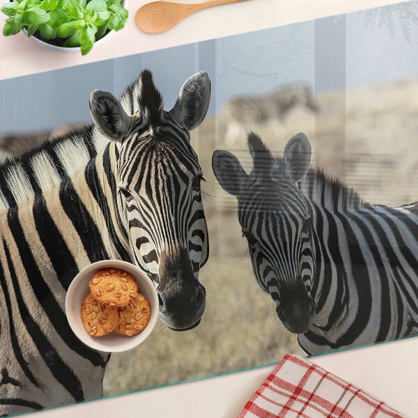 Tagliere in vetro temperato con stampa raffigurante zebre nel loro ambiente naturale
