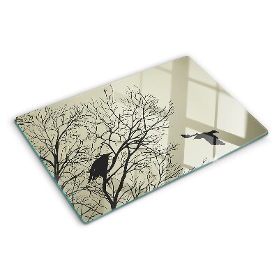 Tagliere in vetro con decorazione di uccelli sui rami degli alberi