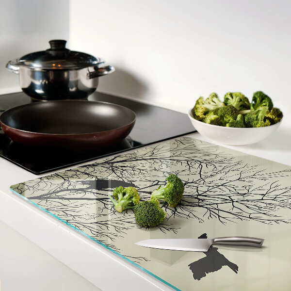 Tagliere in vetro con decorazione di uccelli sui rami degli alberi