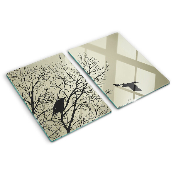 Tagliere in vetro con decorazione di uccelli sui rami degli alberi