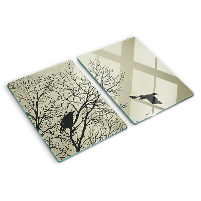 Tagliere in vetro con decorazione di uccelli sui rami degli alberi