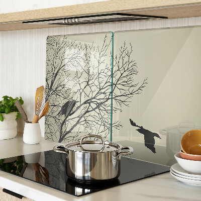Tagliere in vetro con decorazione di uccelli sui rami degli alberi