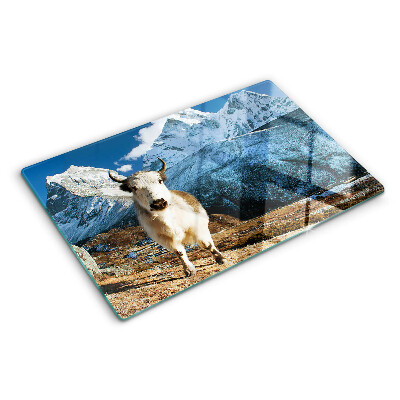 Tagliere in vetro temperato con stampa raffigurante una mucca in montagna