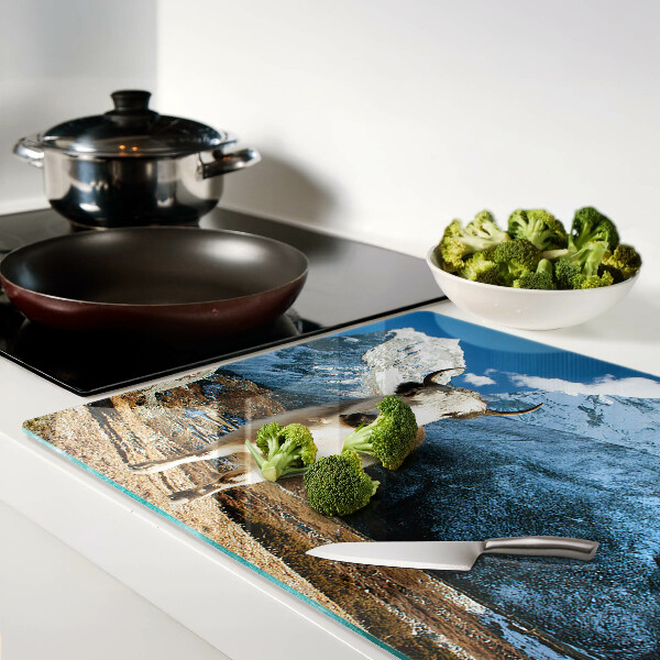 Tagliere in vetro temperato con stampa raffigurante una mucca in montagna