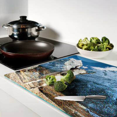 Tagliere in vetro temperato con stampa raffigurante una mucca in montagna