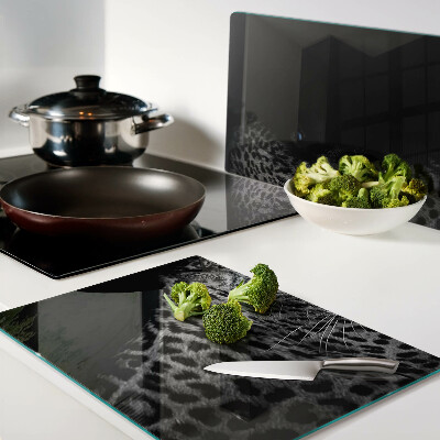 Tagliere in vetro con stampa di una pantera nera dagli occhi azzurri