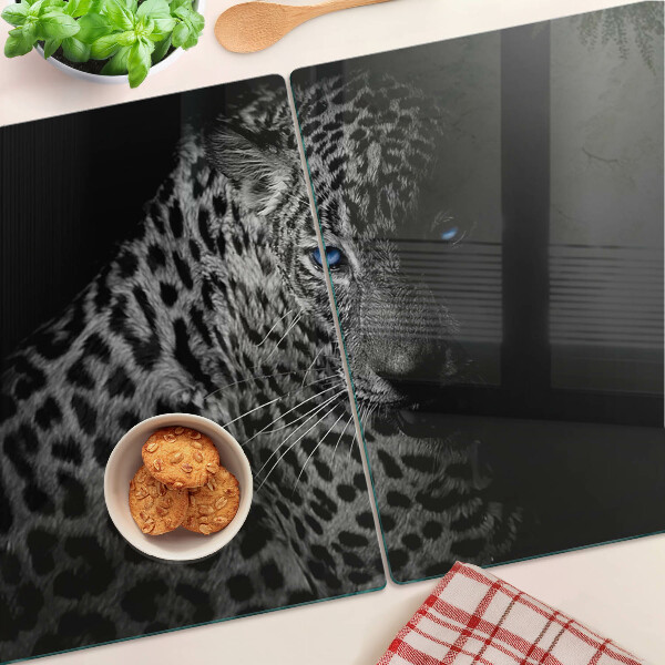 Tagliere in vetro con stampa di una pantera nera dagli occhi azzurri