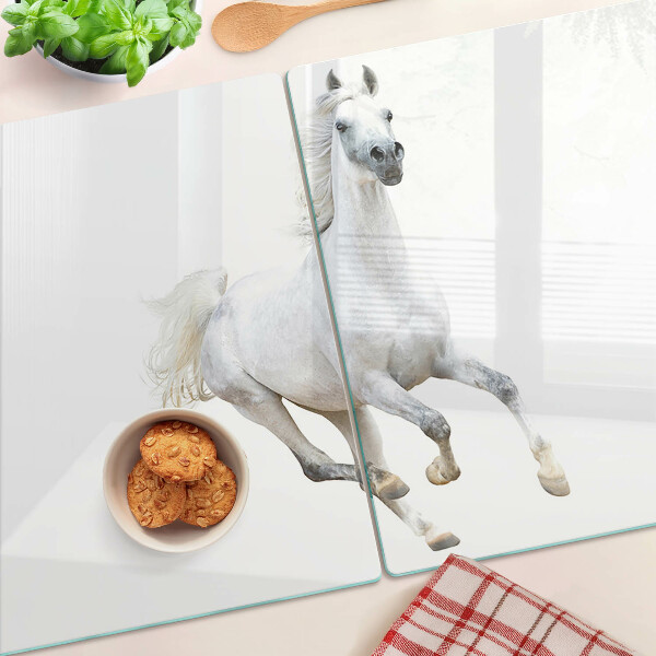 Tagliere in vetro temperato con stampa di un cavallo bianco in movimento