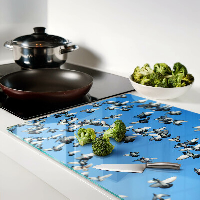 Tagliere in vetro temperato con decorazione di piccioni in volo nel cielo