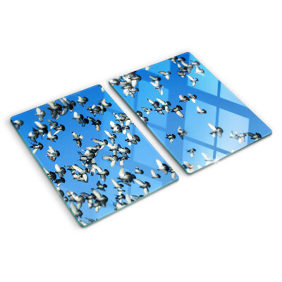 Tagliere in vetro temperato con decorazione di piccioni in volo nel cielo