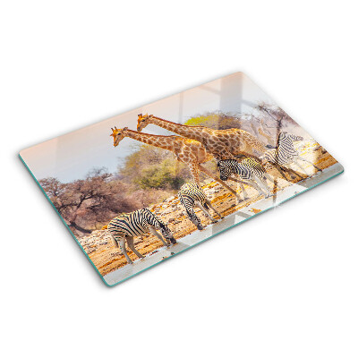 Tagliere in vetro temperato con stampa raffigurante zebra e giraffa nel loro ambiente naturale
