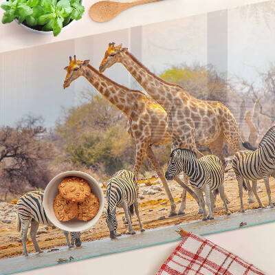 Tagliere in vetro temperato con stampa raffigurante zebra e giraffa nel loro ambiente naturale