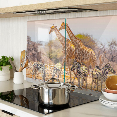 Tagliere in vetro temperato con stampa raffigurante zebra e giraffa nel loro ambiente naturale