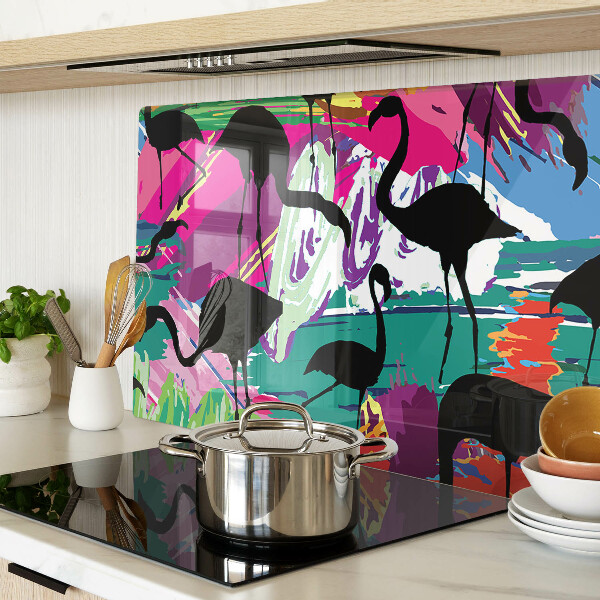 Tagliere in vetro con decorazione di fenicotteri su sfondo colorato