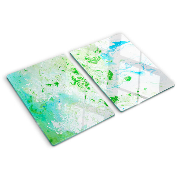 Tagliere in vetro con motivo a vortici astratti nei toni del verde e del blu