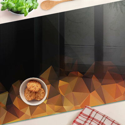 Tagliere in vetro temperato con decorazione a motivo geometrico ispirata a un falò