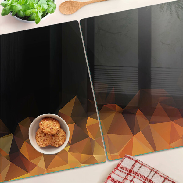 Tagliere in vetro temperato con decorazione a motivo geometrico ispirata a un falò