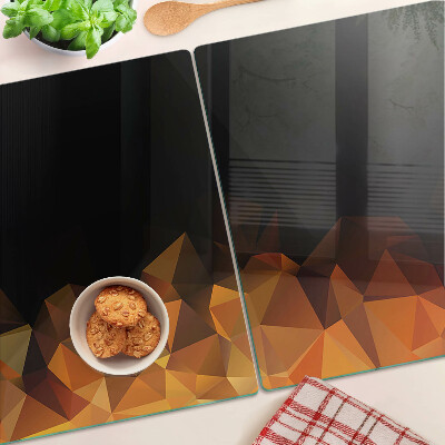 Tagliere in vetro temperato con decorazione a motivo geometrico ispirata a un falò