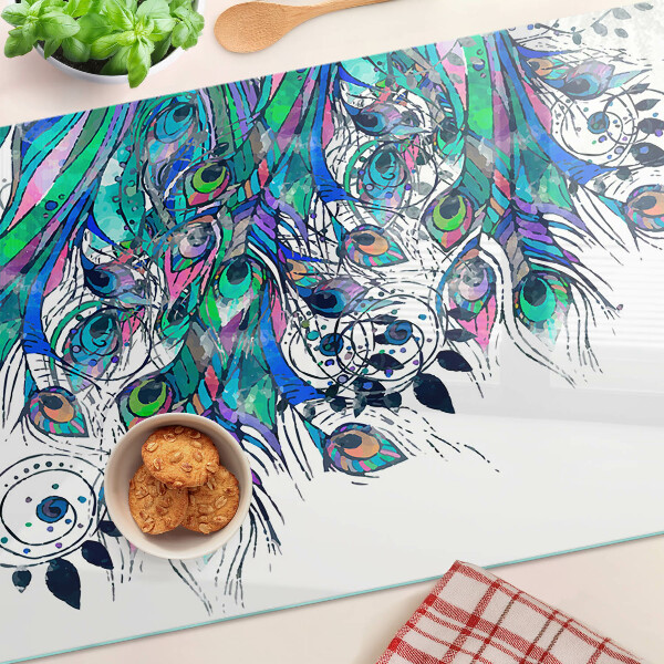 Tagliere in vetro temperato con motivo di piume di pavone nei toni del verde e del blu