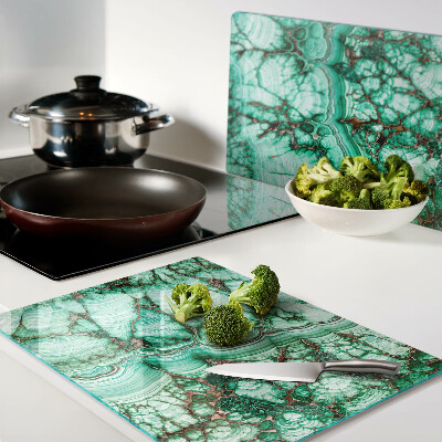 Tagliere in vetro con motivo in marmo nei toni del verde