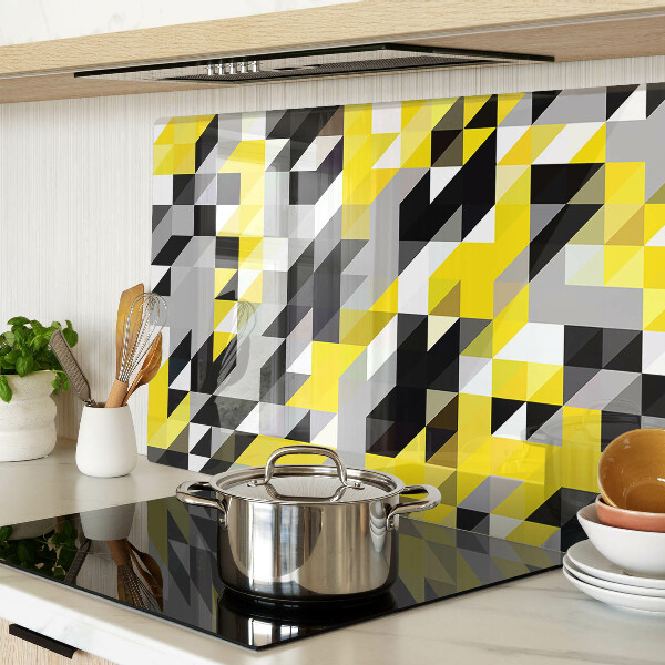 Tagliere in vetro con motivo geometrico nei toni del giallo e del nero