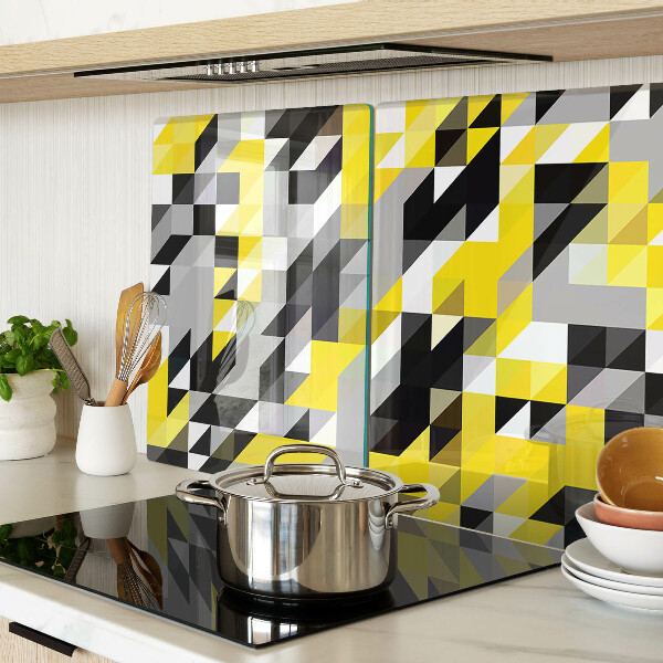 Tagliere in vetro con motivo geometrico nei toni del giallo e del nero