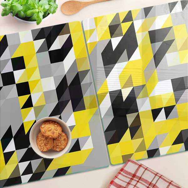 Tagliere in vetro con motivo geometrico nei toni del giallo e del nero