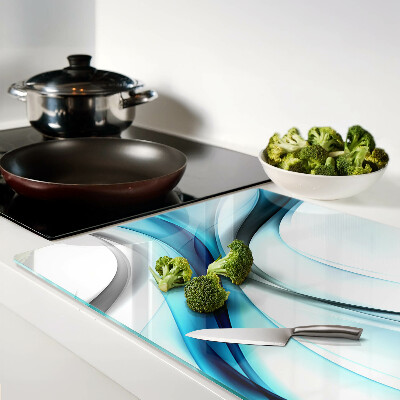 Tagliere in vetro temperato con motivo a onde nei toni del blu