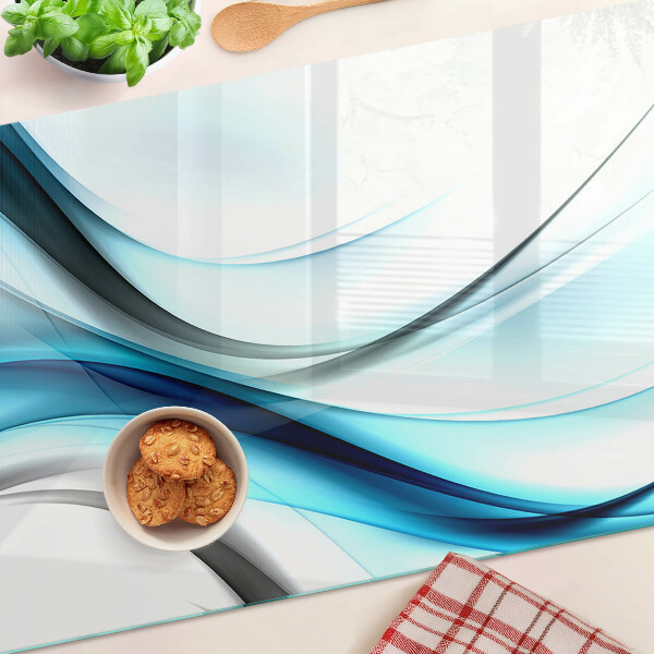 Tagliere in vetro temperato con motivo a onde nei toni del blu