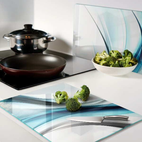 Tagliere in vetro temperato con motivo a onde nei toni del blu
