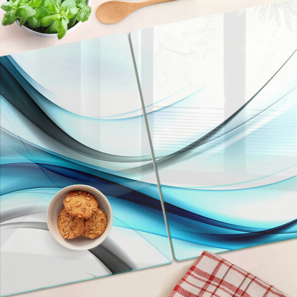 Tagliere in vetro temperato con motivo a onde nei toni del blu